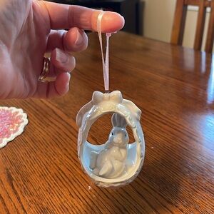 Vintage White Ceramic Bunny sitting in Egg Ornament